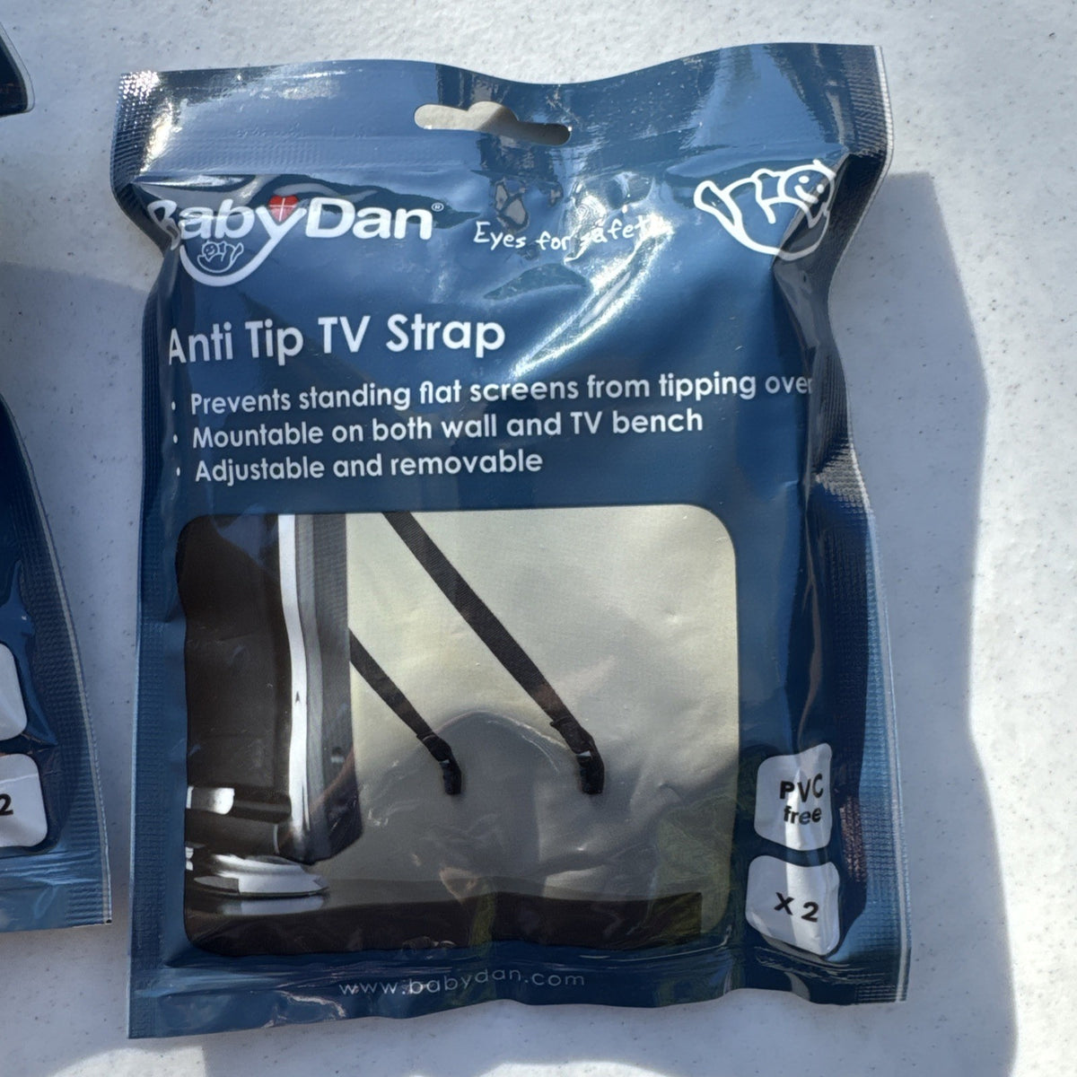 Baby Dan black adjustable anti-tip TV safety straps lot of two factory sealed packages.