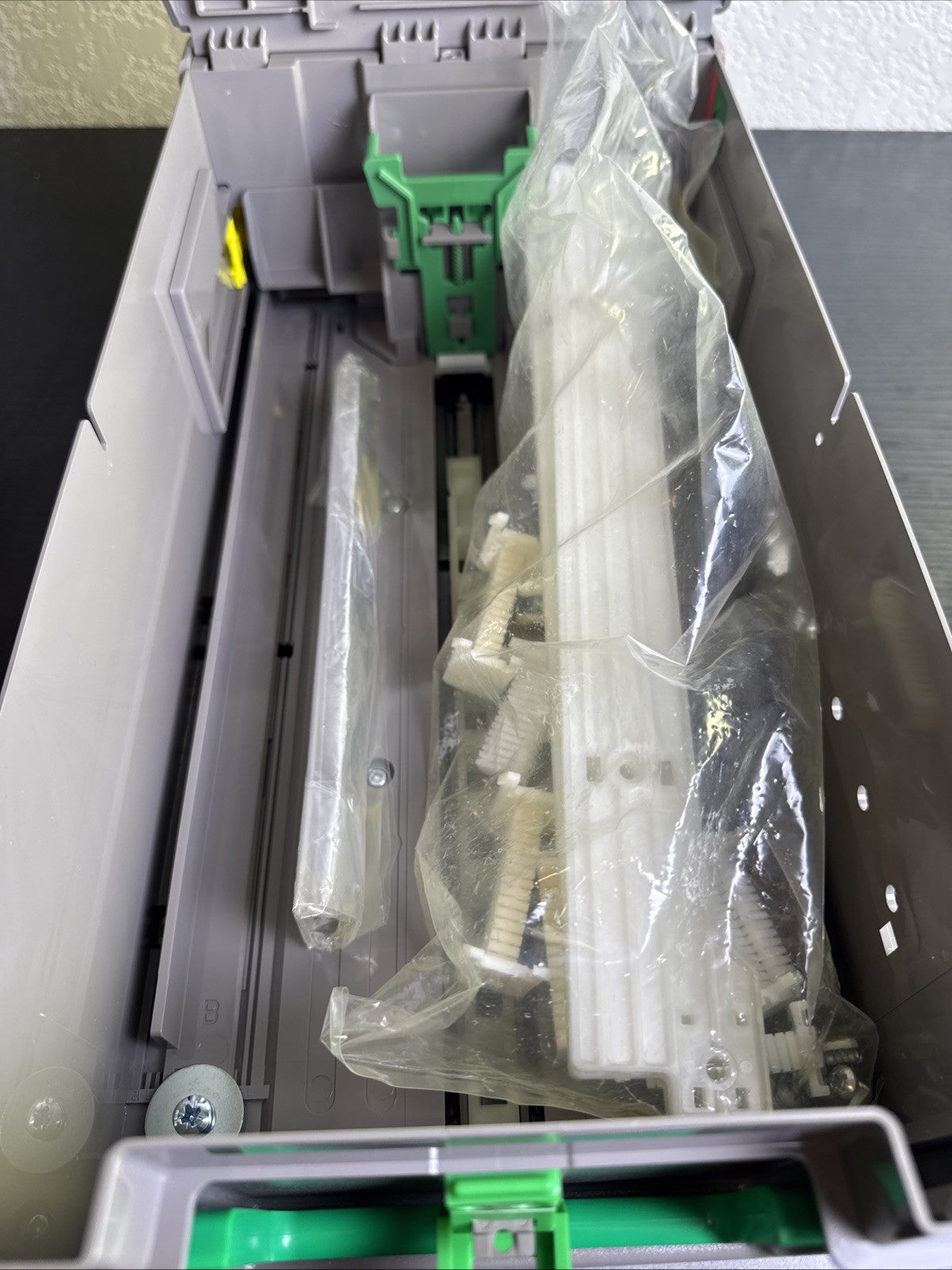 NCR Non-TI wide currency cassette assembly MPN 445-0689215 in unused New Old Stock open box condition