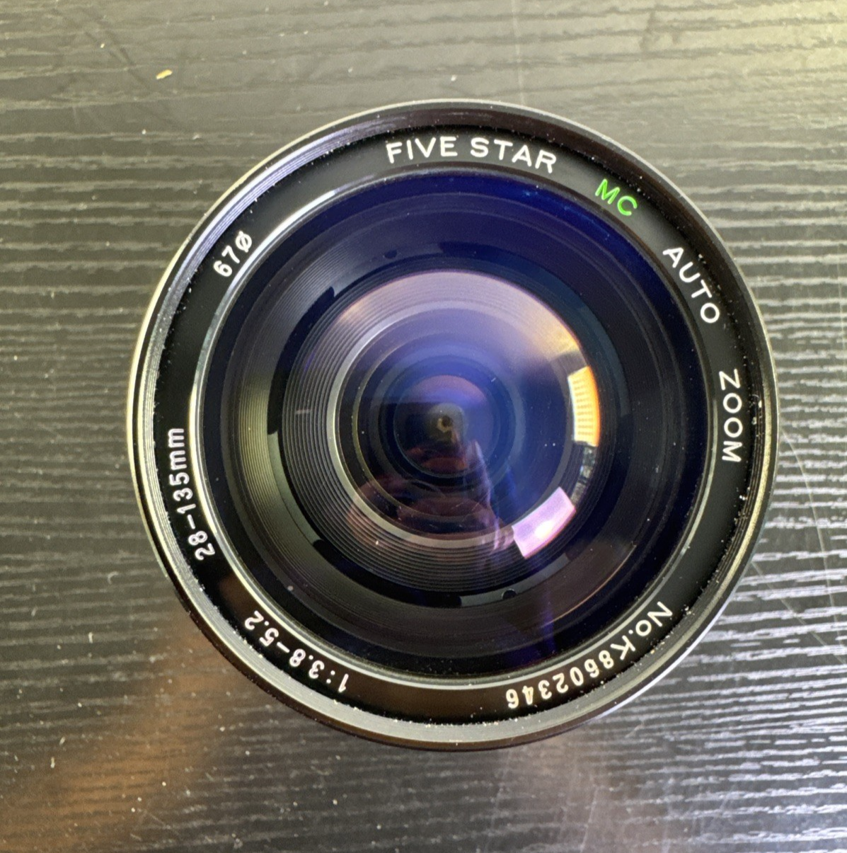 Five Star MC Auto Zoom 28-135mm f/3.8-5.2 macro lens with Pentax K mount made in Japan.
