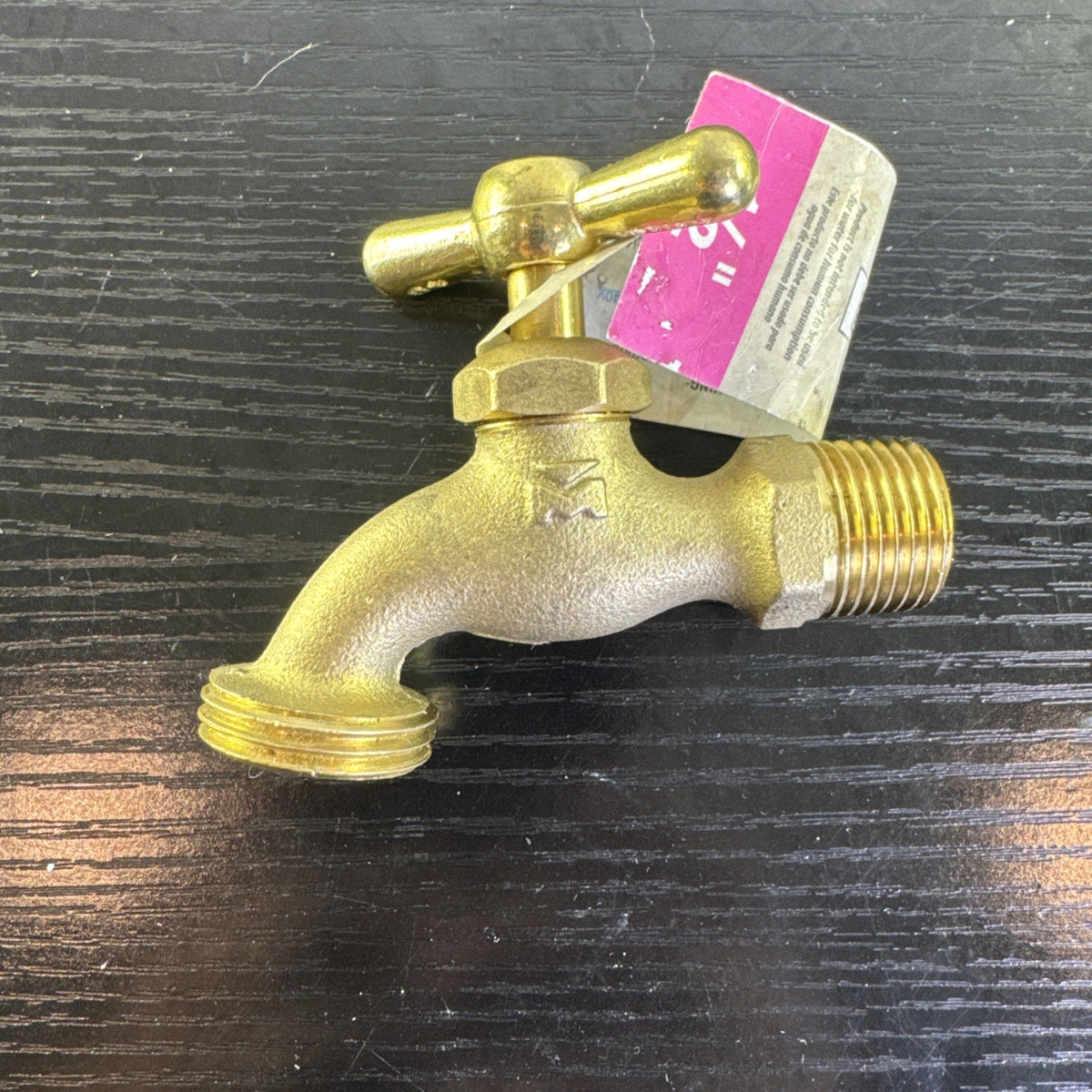 New Everbilt brass hose bibb valve with 1/2 inch MIP and 3/4 inch MHT connections