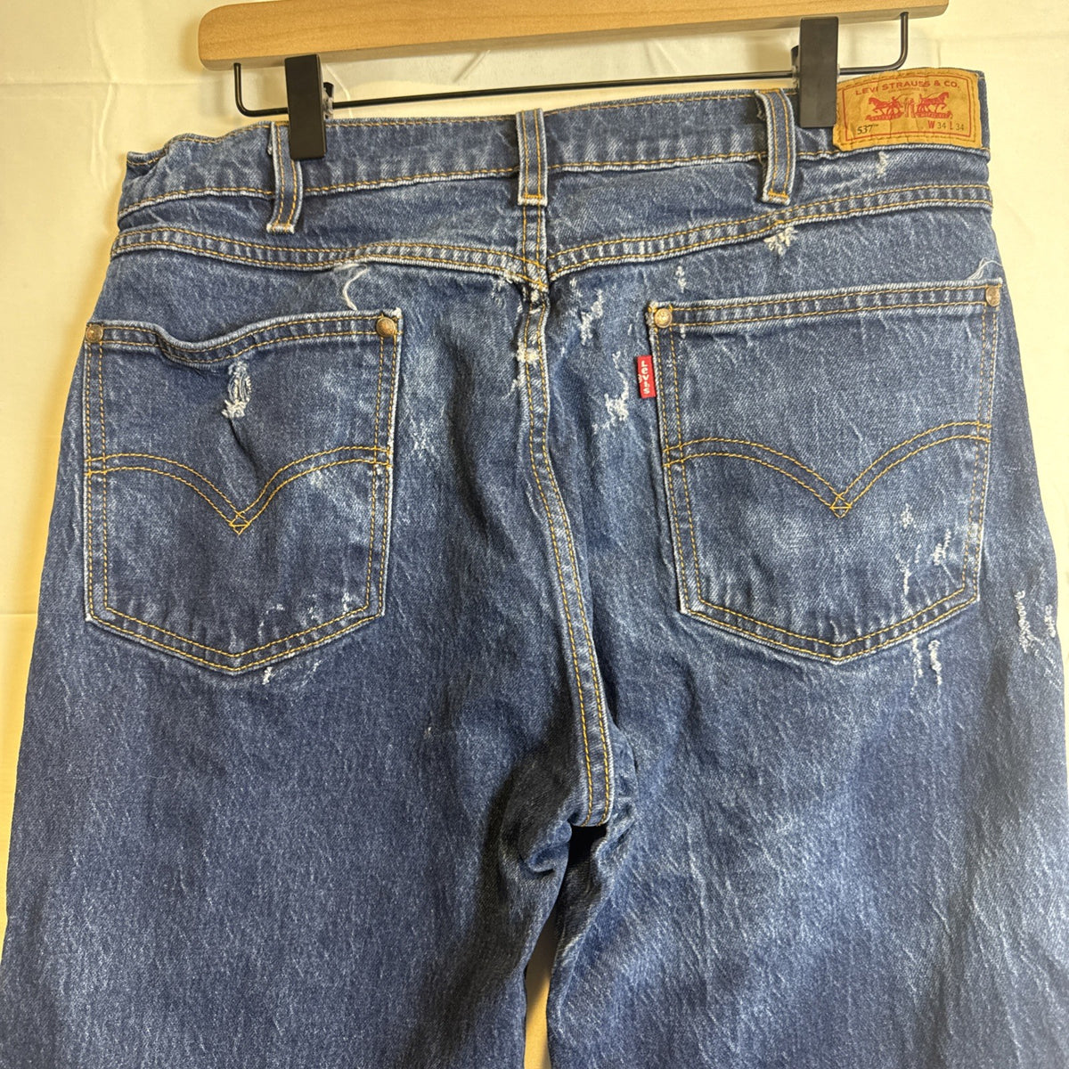 Levi's 537 men's regular fit straight leg jeans in dark wash blue denim, size 32x31