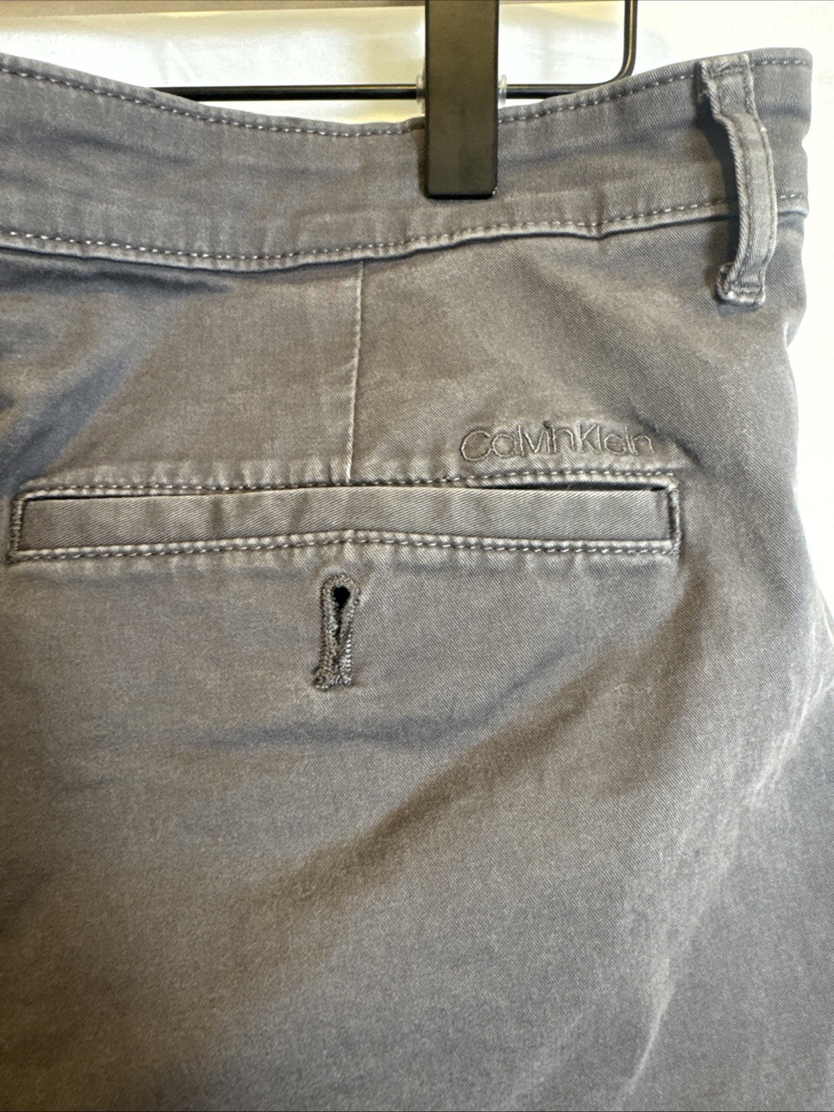 Calvin Klein men's contractor straight leg pants in black and gray, size 34x29.