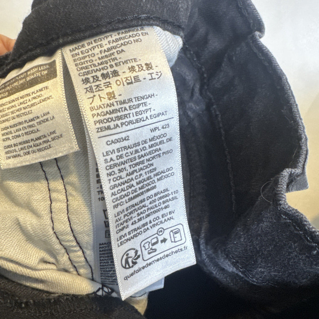 Levi's 505 men's slim straight black denim jeans size 34x27 in good pre-owned condition