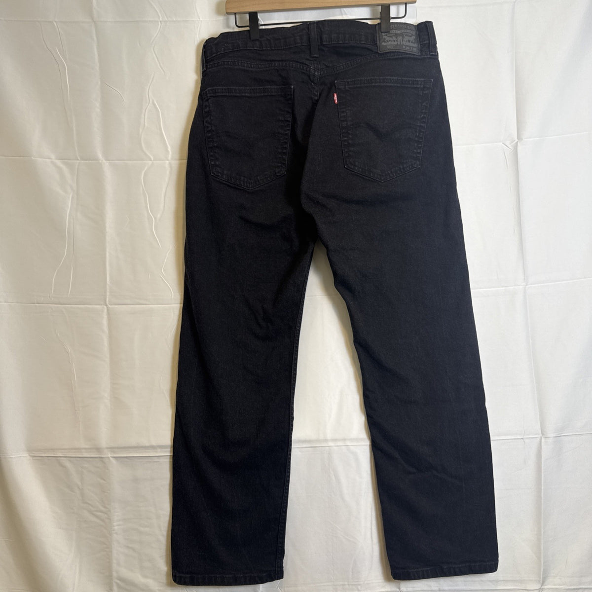 Levi's 505 men's slim straight black denim jeans size 34x27 in good pre-owned condition