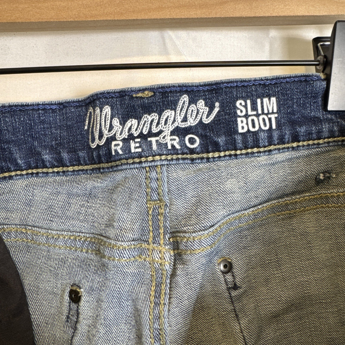 Wrangler Retro slim bootcut men's denim blue jeans in size 34x27 with medium wash