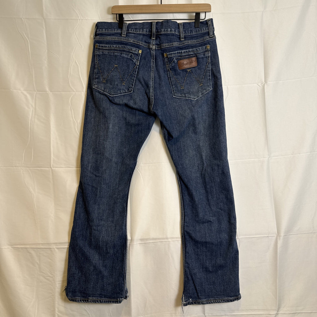 Wrangler Retro slim bootcut men's denim blue jeans in size 34x27 with medium wash