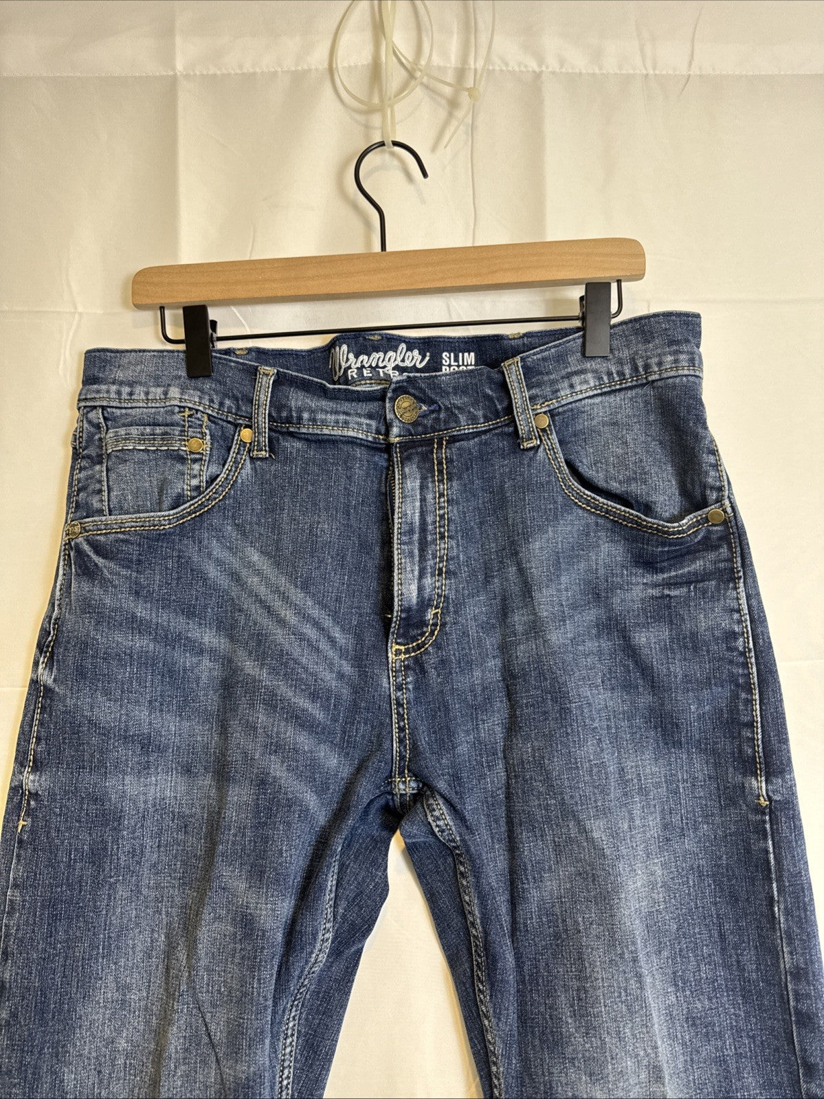 Wrangler Retro slim bootcut men's denim blue jeans in size 34x27 with medium wash