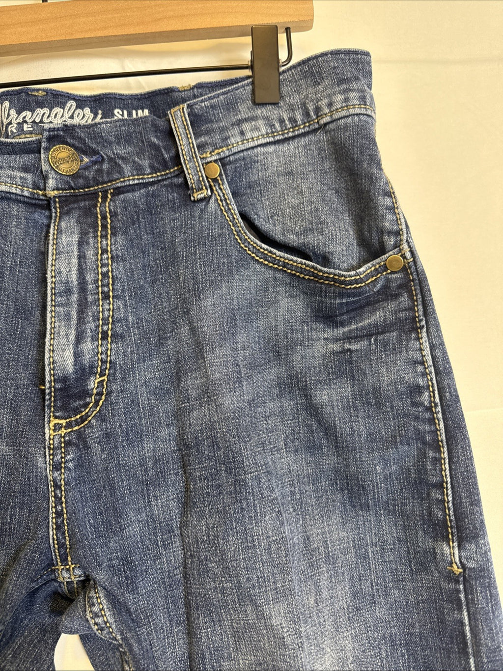 Wrangler Retro slim bootcut men's denim blue jeans in size 34x27 with medium wash