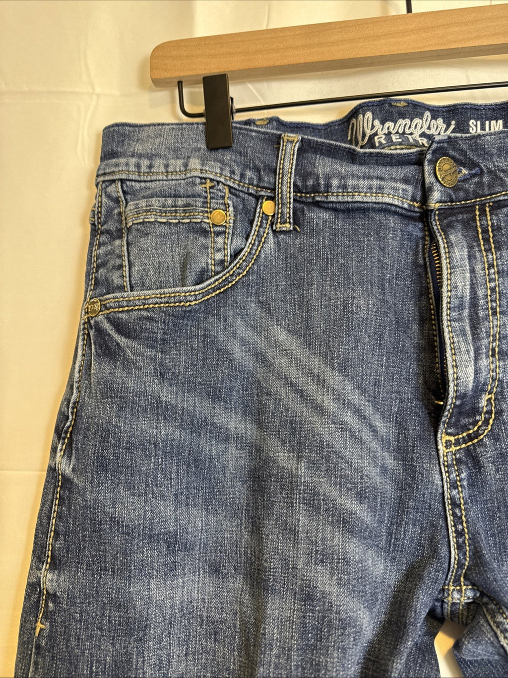 Wrangler Retro slim bootcut men's denim blue jeans in size 34x27 with medium wash