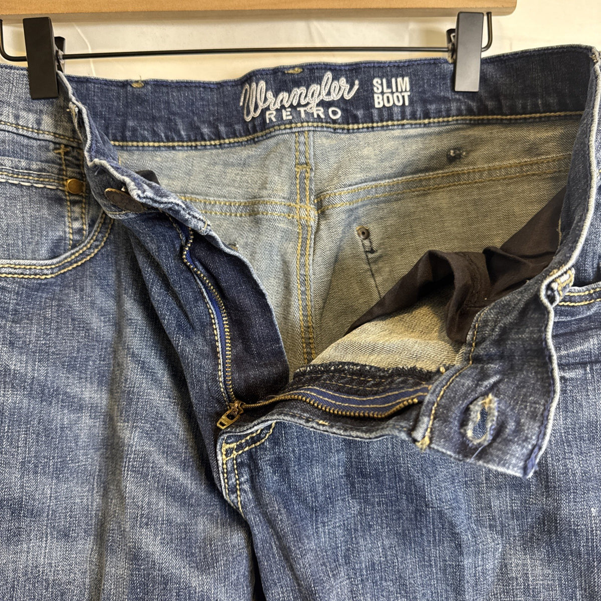 Wrangler Retro slim bootcut men's denim blue jeans in size 34x27 with medium wash