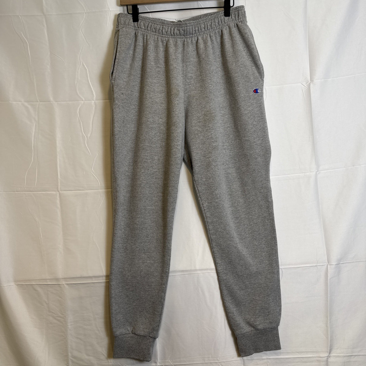 Champion men's gray cotton blend fleece sweatpants in size Large with drawstring elastic waist and logo.