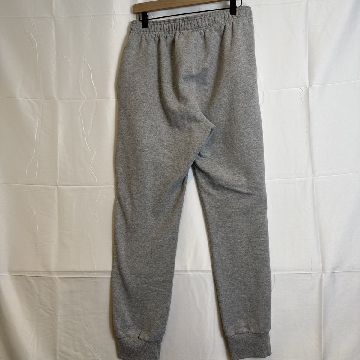 Champion men's gray cotton blend fleece sweatpants in size Large with drawstring elastic waist and logo.