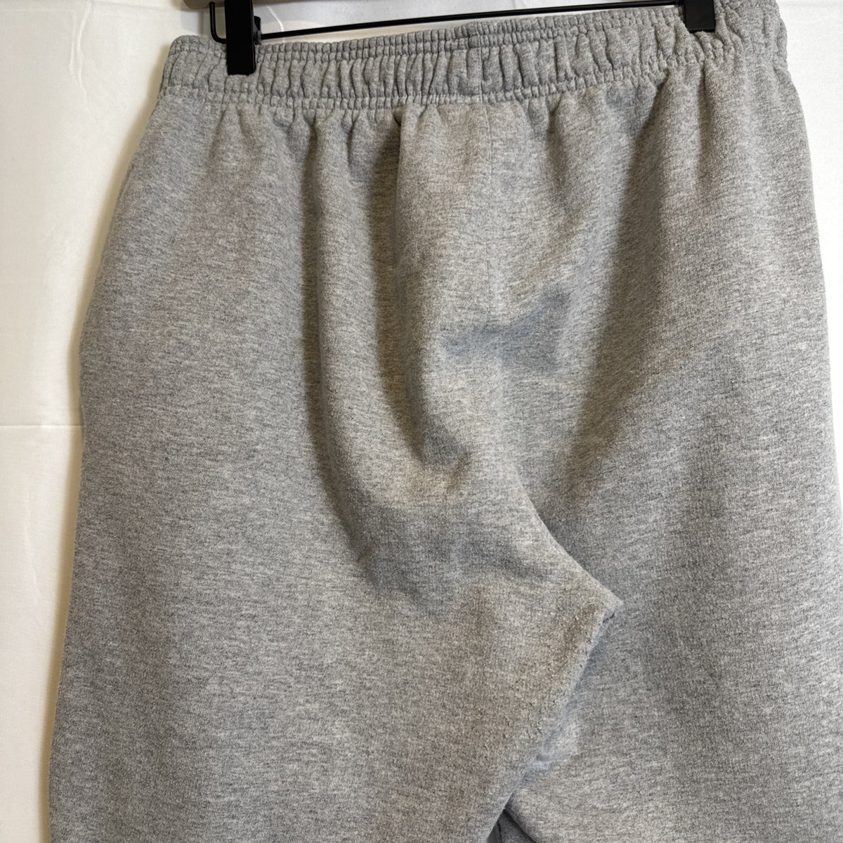Champion men's gray cotton blend fleece sweatpants in size Large with drawstring elastic waist and logo.