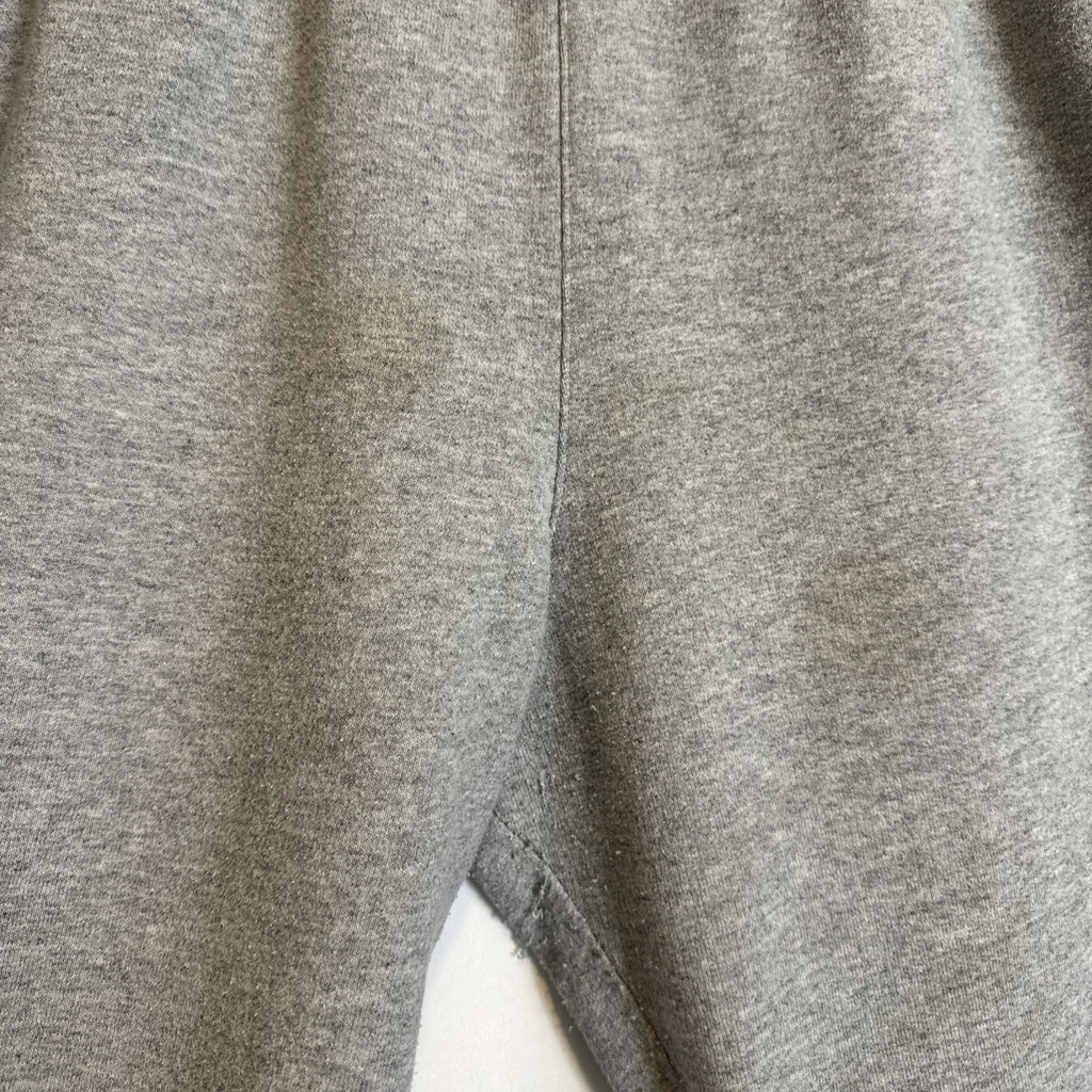 Champion men's gray cotton blend fleece sweatpants in size Large with drawstring elastic waist and logo.