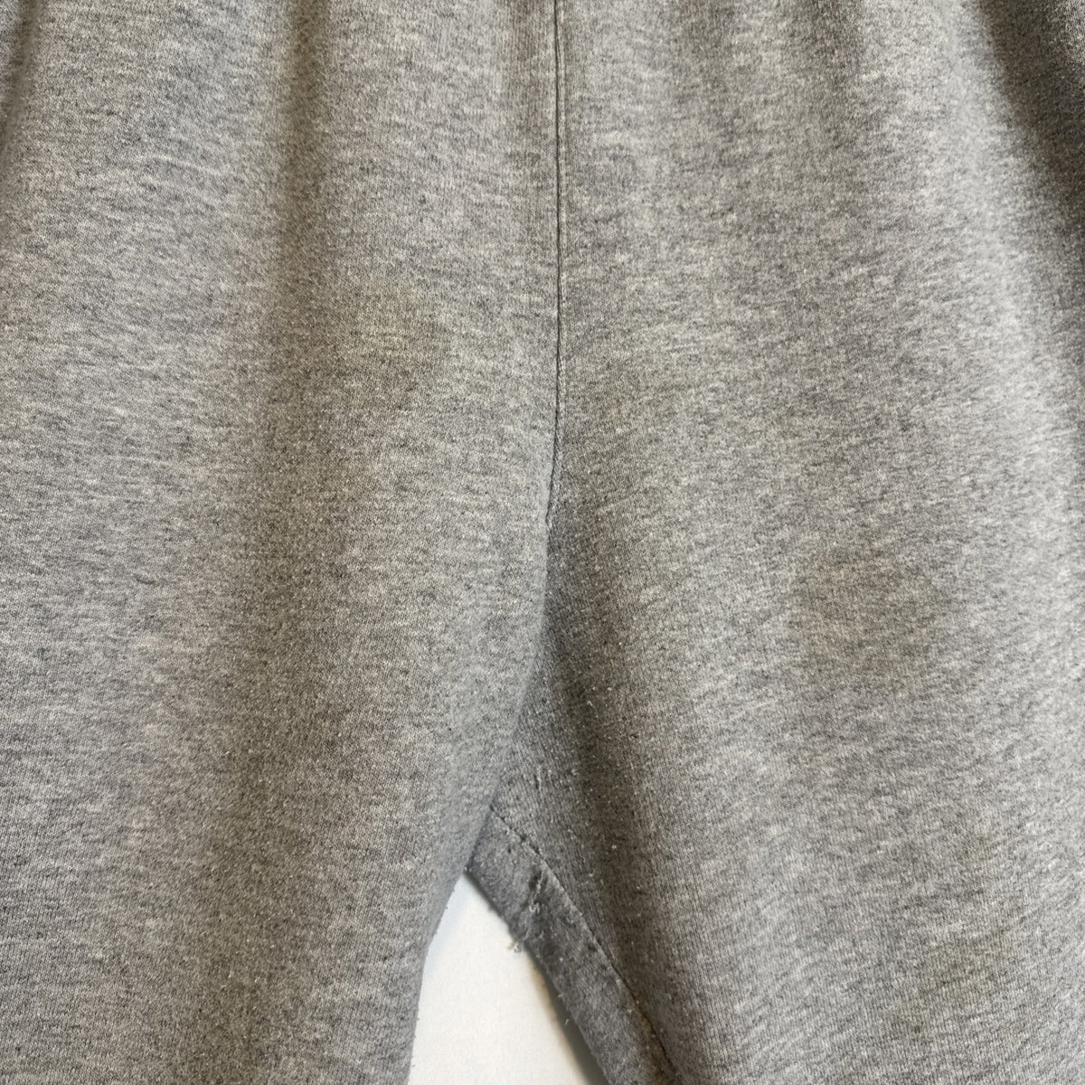 Champion men's gray cotton blend fleece sweatpants in size Large with drawstring elastic waist and logo.