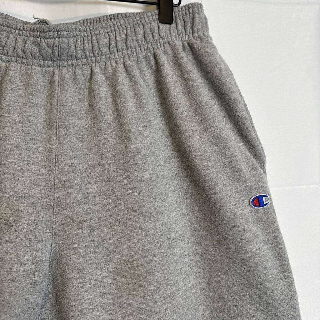 Champion men's gray cotton blend fleece sweatpants in size Large with drawstring elastic waist and logo.