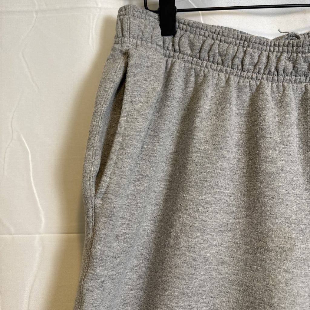 Champion men's gray cotton blend fleece sweatpants in size Large with drawstring elastic waist and logo.