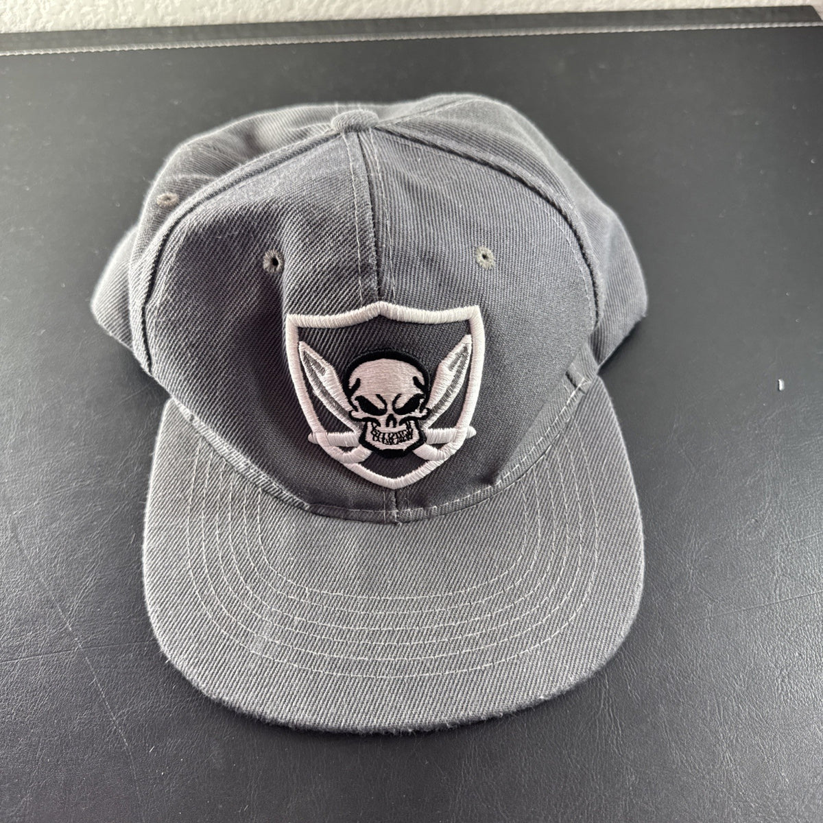 Gray Wynn Las Vegas Raiders Headline CrossSword snapback hat cap