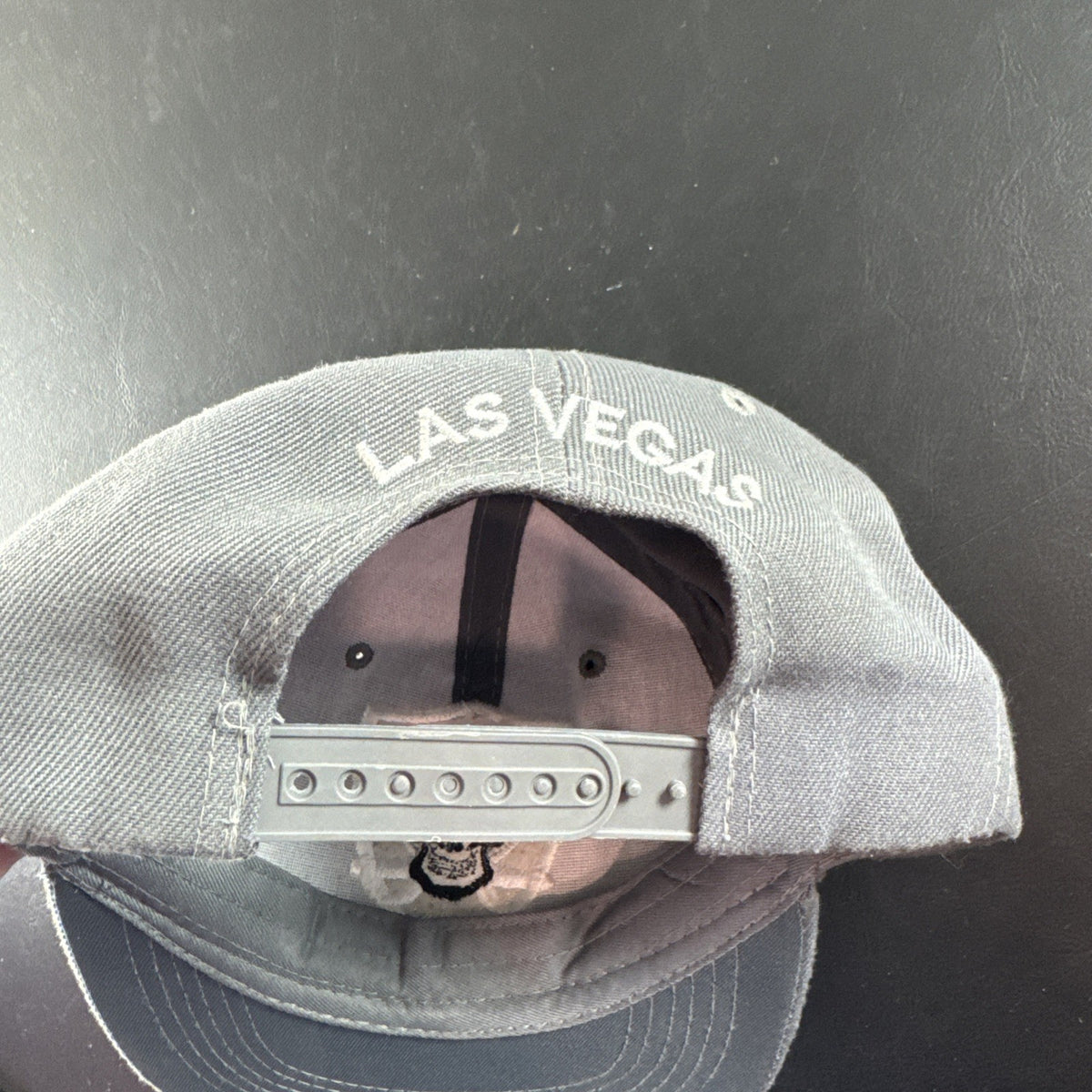 Gray Wynn Las Vegas Raiders Headline CrossSword snapback hat cap