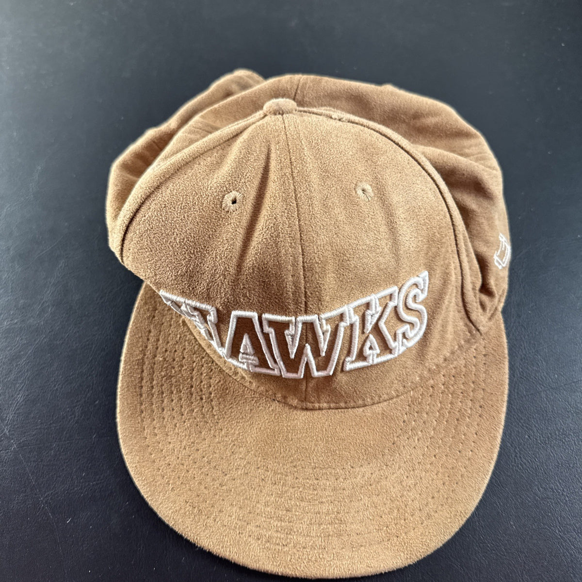 Tan Atlanta Hawks NBA basketball snapback hat featuring the embroidered team logo