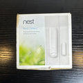 Open box Google Nest Detect H1100WES wireless door and window sensor showing its sleek white design.