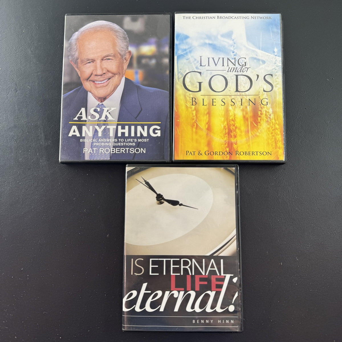 Set of 3 Christian faith and spirituality DVDs featuring Pat Robertson and Benny Hinn