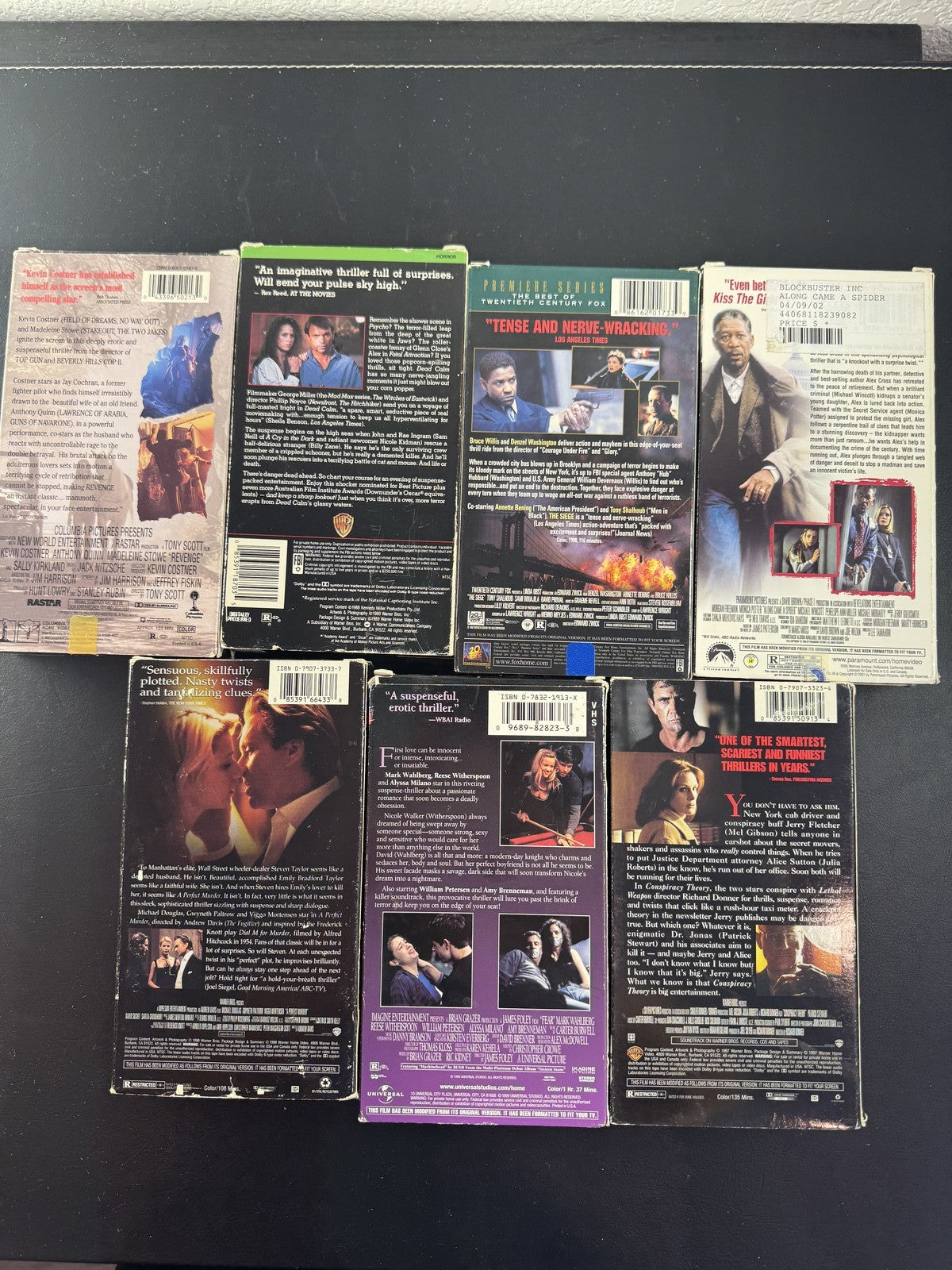 Set of 7 90s suspense thriller VHS tapes including Conspiracy Theory and A Perfect Murder.