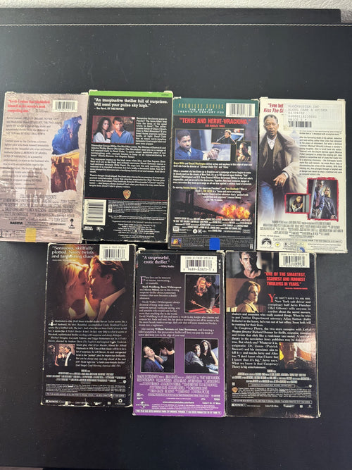 Set of 7 90s suspense thriller VHS tapes including Conspiracy Theory and A Perfect Murder.