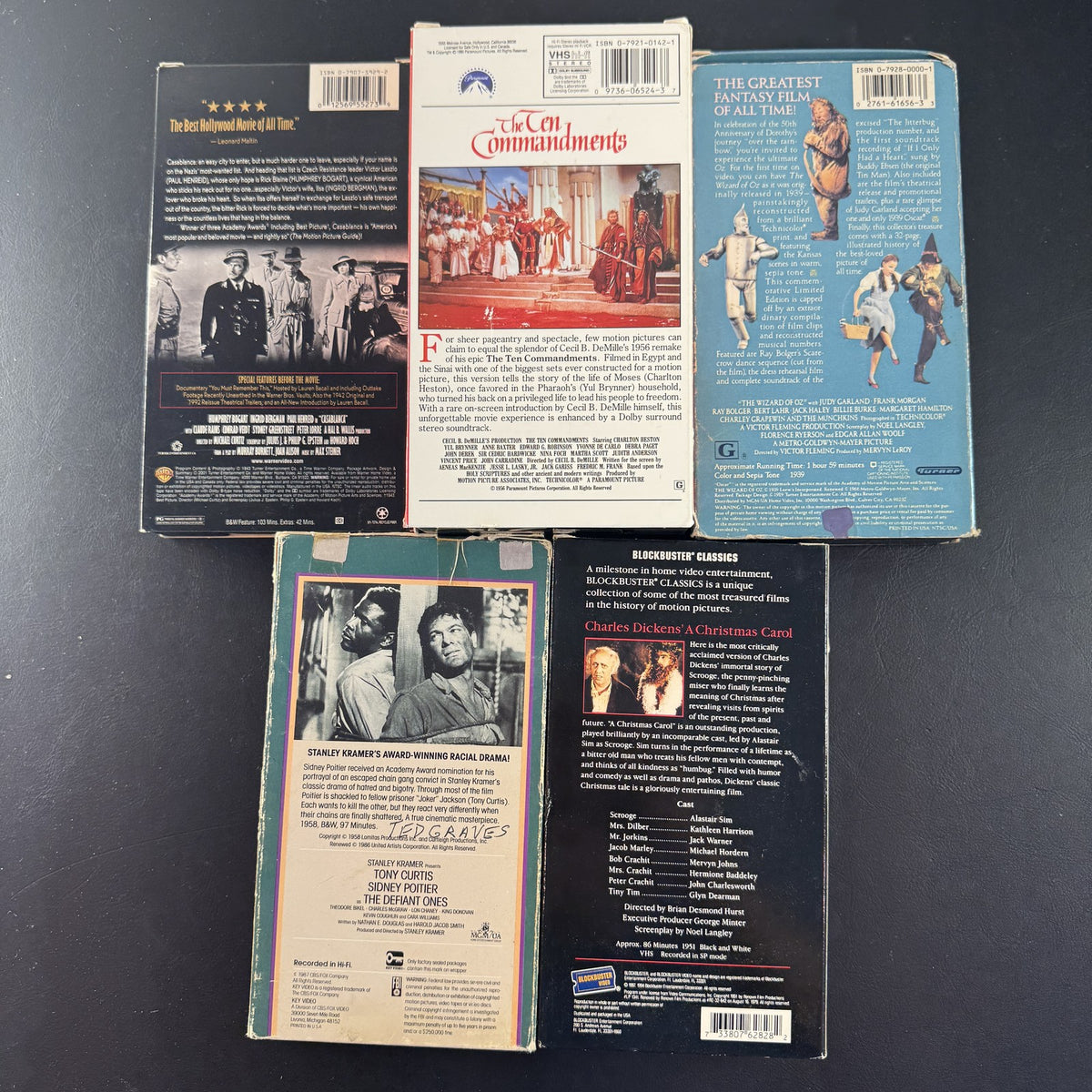 Set of 5 vintage Golden Age Hollywood movie VHS tapes including Casablanca, The Wizard of Oz, and The Ten Commandments.