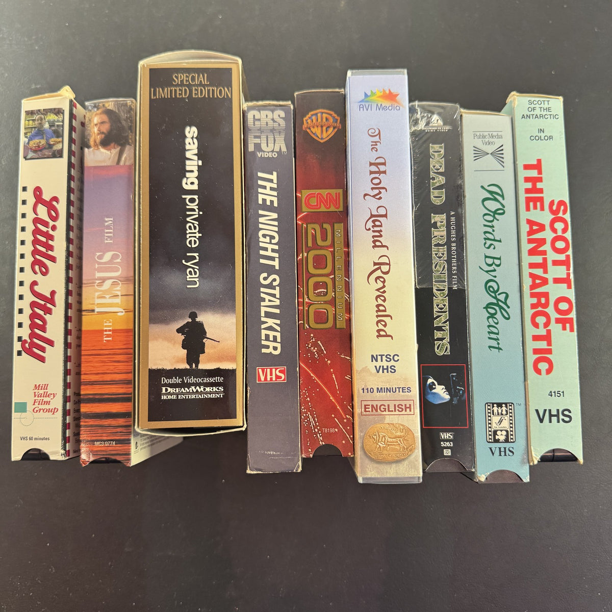 Lot of 9 vintage assorted VHS tapes including Saving Private Ryan and Dead Presidents