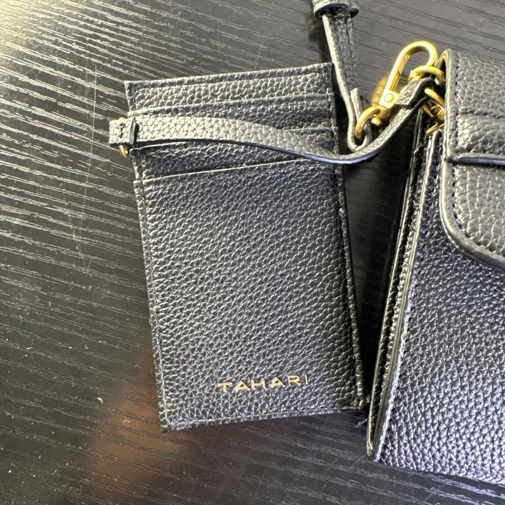 Tahari black pebbled faux leather crossbody bag with goldtone chain accent and magnetic flap closure