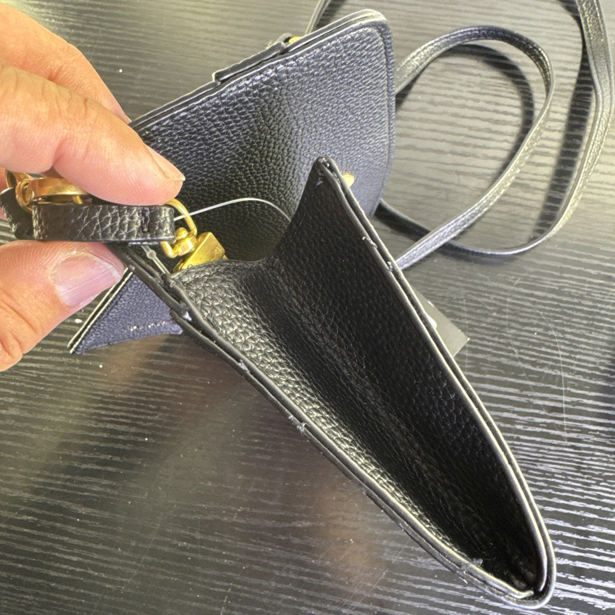 Tahari black pebbled faux leather crossbody bag with goldtone chain accent and magnetic flap closure