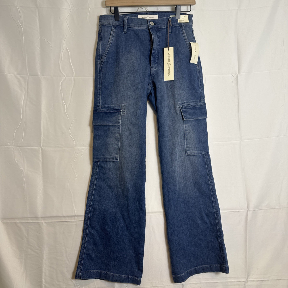 Vintage America women's medium wash stretch denim cargo bootcut jeans in size 4, new with tags.