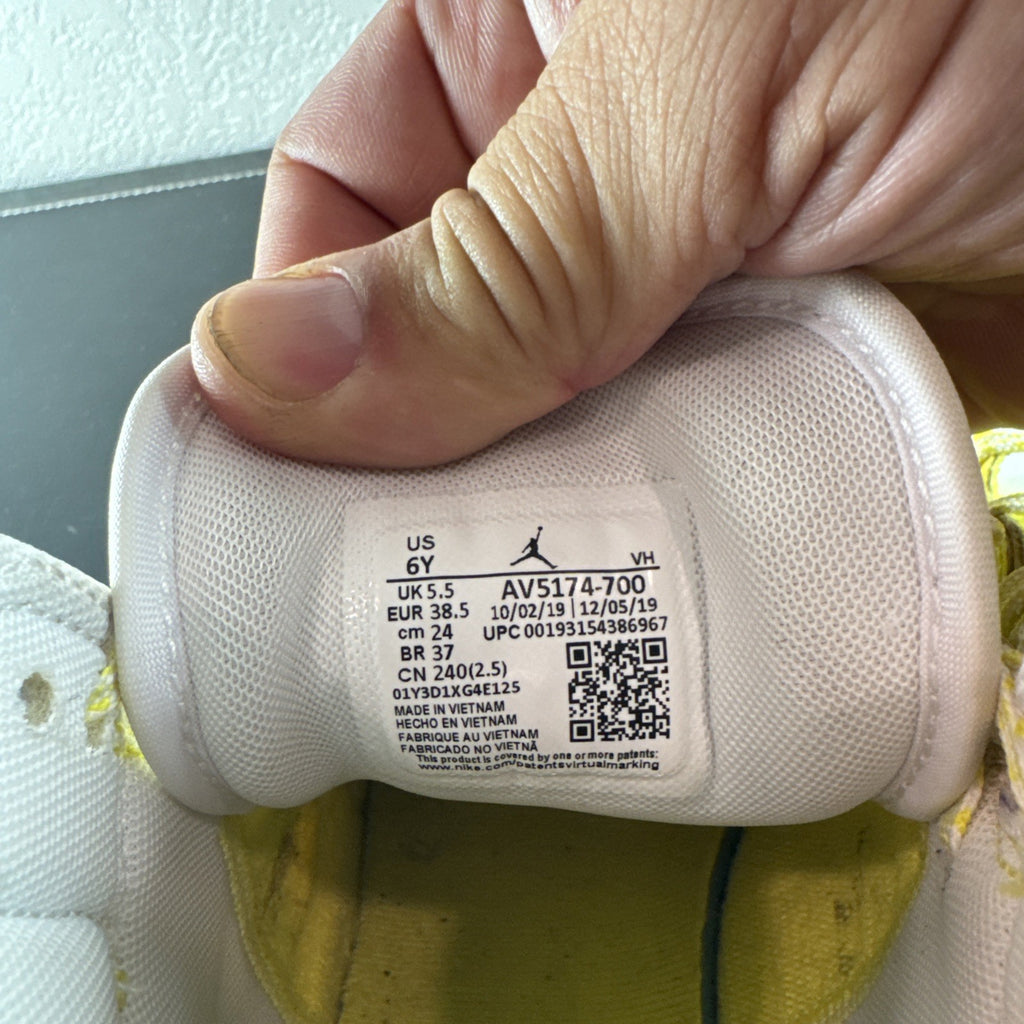 Nike Air Jordan 1 Mid SE GS Rose Patch sneakers in Dynamic Yellow leather, kids size 6Y.