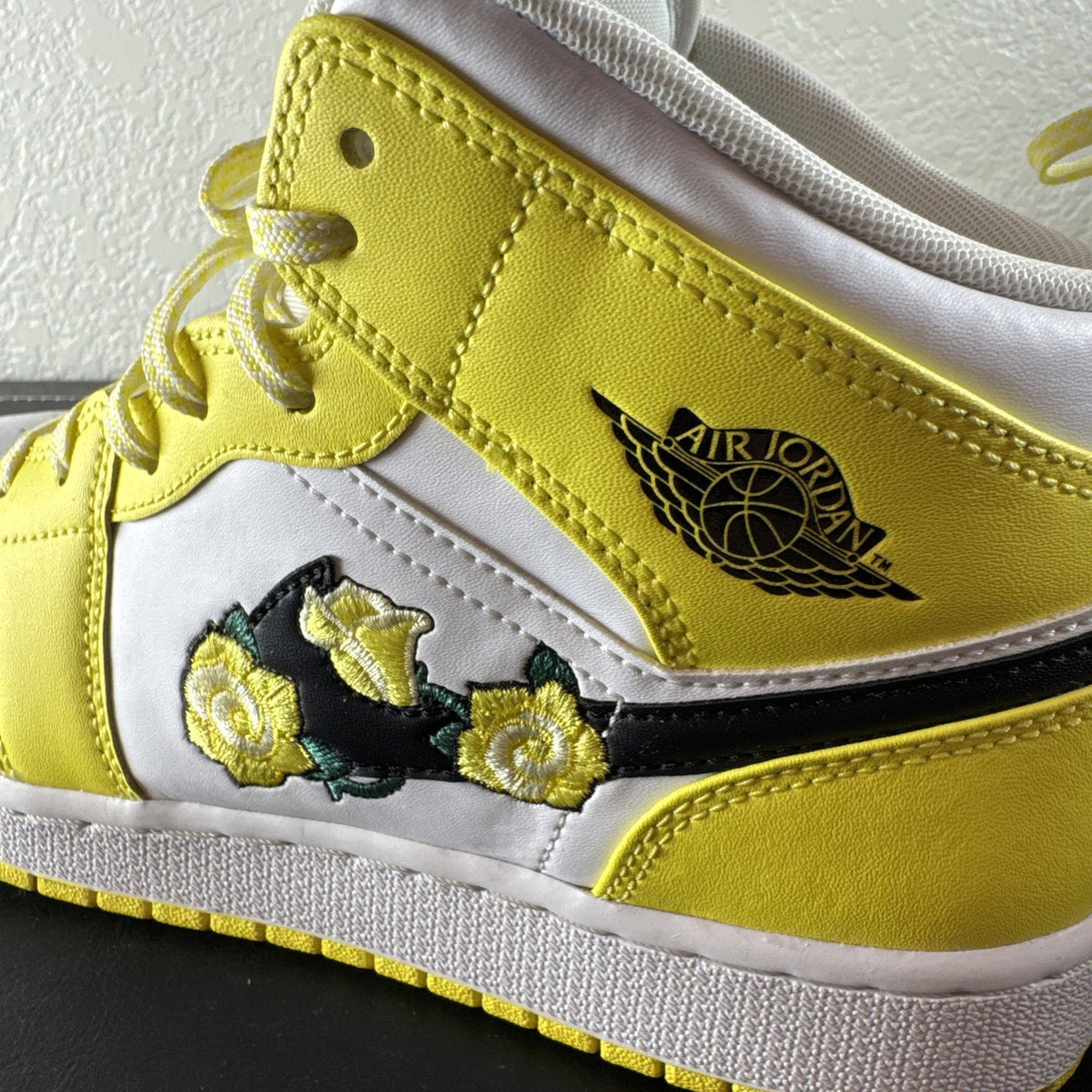 Nike Air Jordan 1 Mid SE GS Rose Patch sneakers in Dynamic Yellow leather, kids size 6Y.