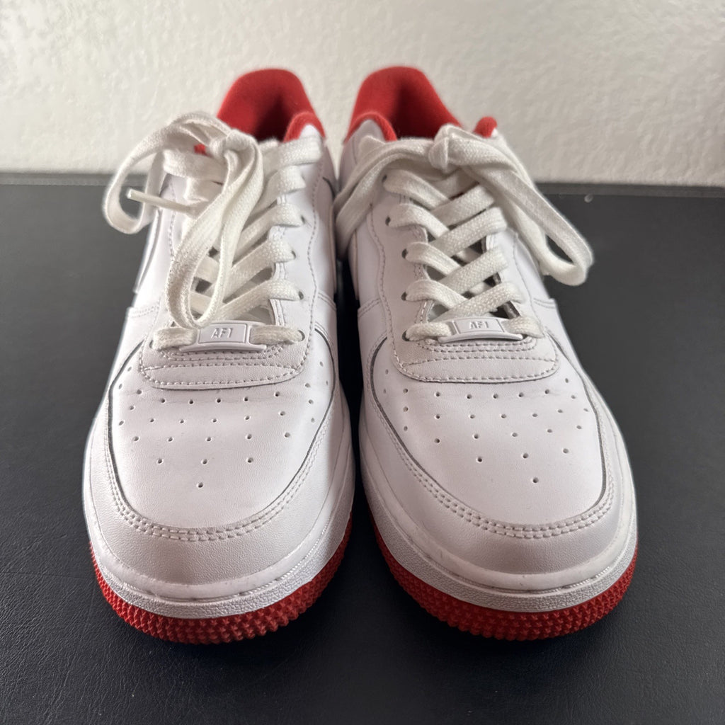 Nike Air Force 1 Low sneakers in White and University Red leather, Youth size 7Y.