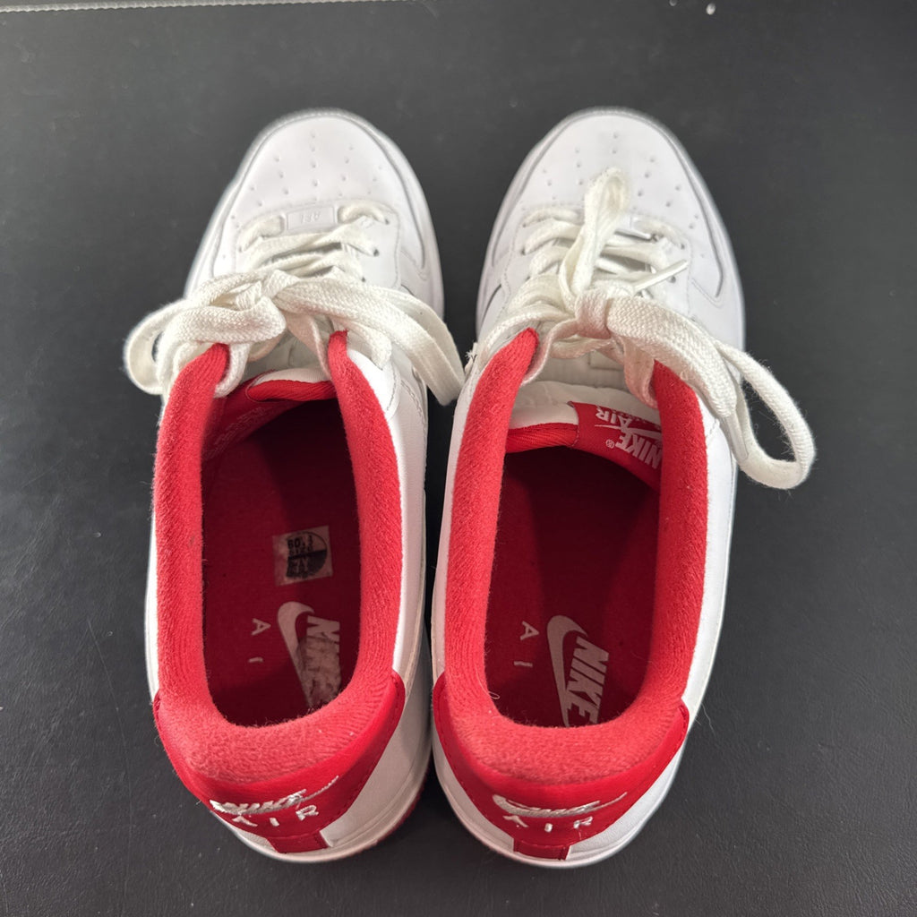 Nike Air Force 1 Low sneakers in White and University Red leather, Youth size 7Y.