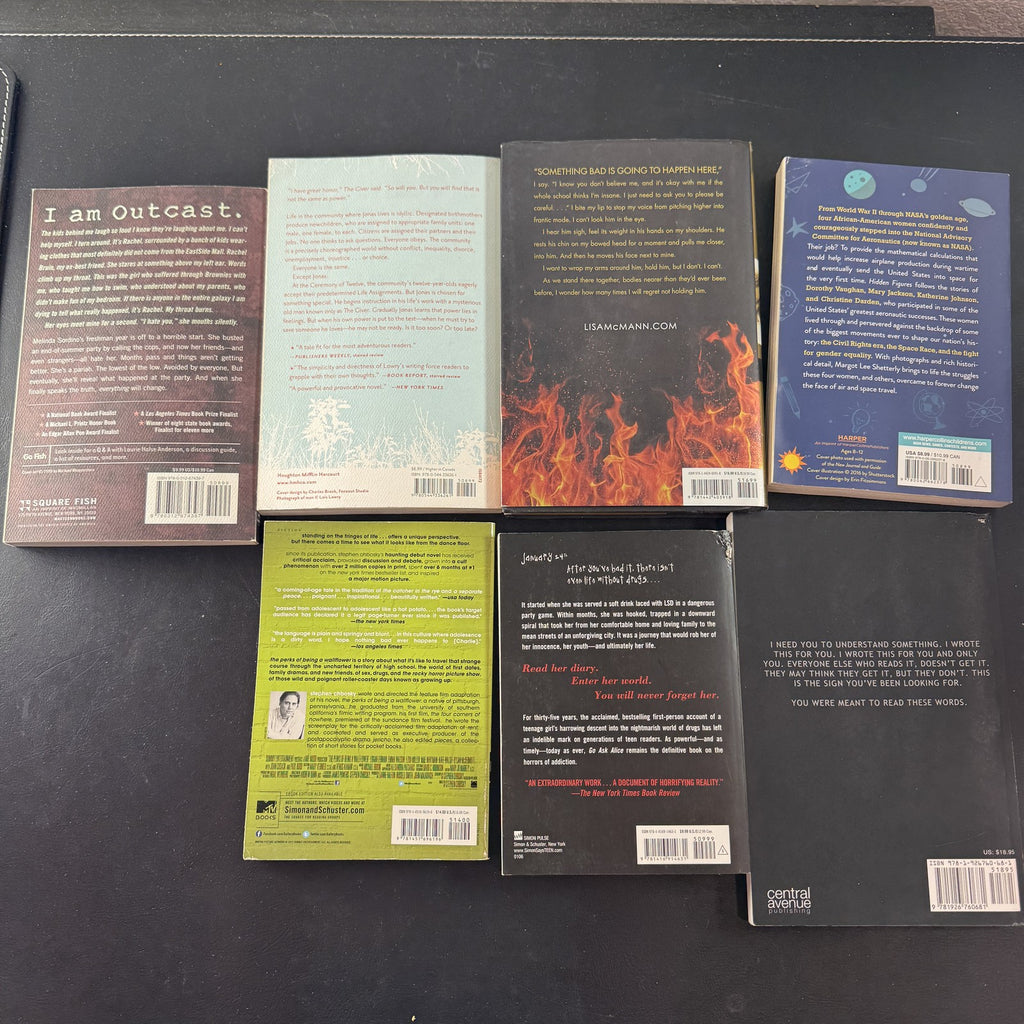 Collection of 7 young adult classic paperback books including The Giver and The Perks of Being a Wallflower