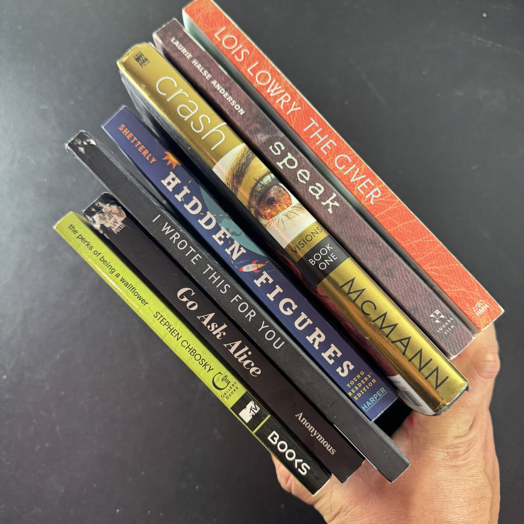 Collection of 7 young adult classic paperback books including The Giver and The Perks of Being a Wallflower