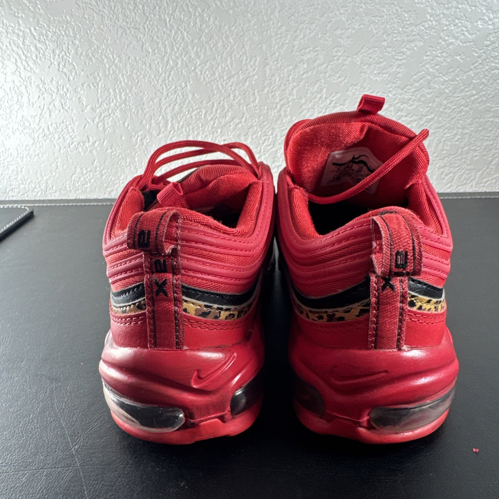 Nike Air Max 97 Leopard Pack red sneakers in women's size 8 showing low-top synthetic upper and outsole detail