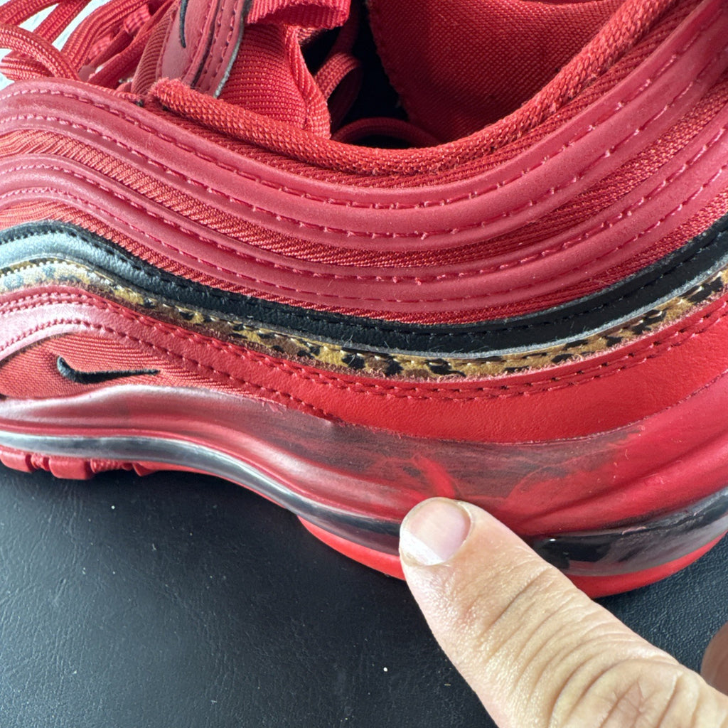 Nike Air Max 97 Leopard Pack red sneakers in women's size 8 showing low-top synthetic upper and outsole detail