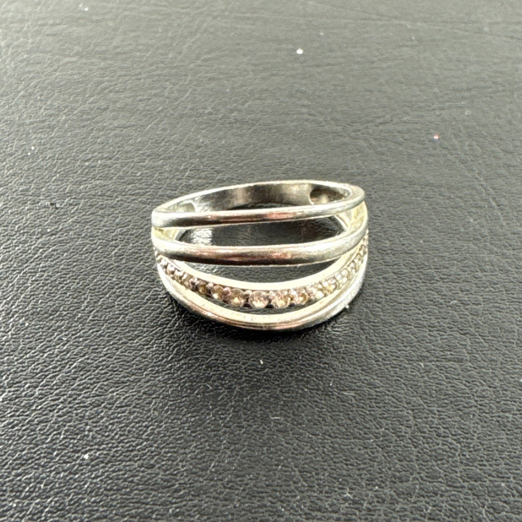 Sterling silver multi-row crossover ring with natural white zircon and diamond accents, size 7