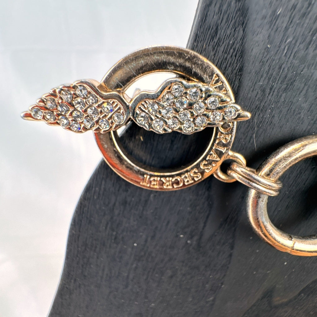 Victoria's Secret rose gold chain bracelet bundle featuring pavé rhinestone angel wings and toggle clasps