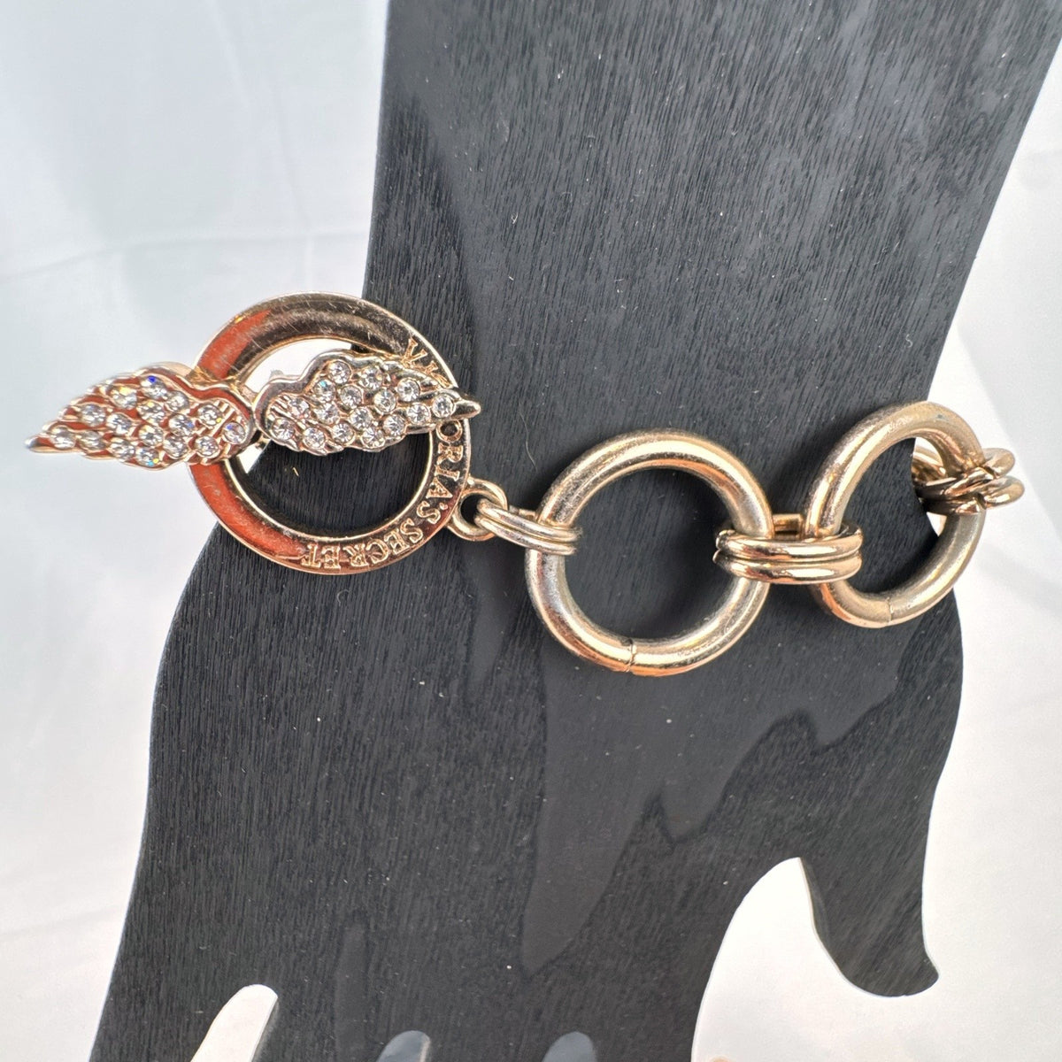 Victoria's Secret rose gold chain bracelet bundle featuring pavé rhinestone angel wings and toggle clasps