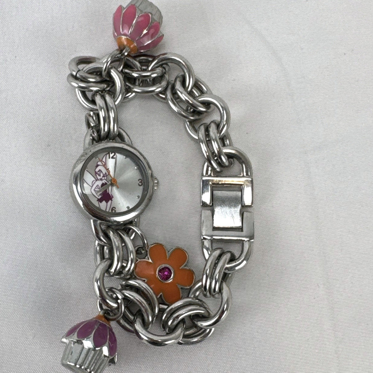 Disney Tinker Bell silver-tone charm bracelet watch with enamel cupcake and flower charms