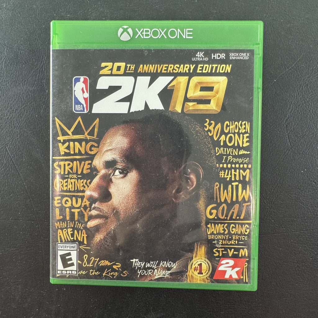 NBA 2K19 20th Anniversary Edition Xbox One game case with LeBron James cover and original disc in very good condition.