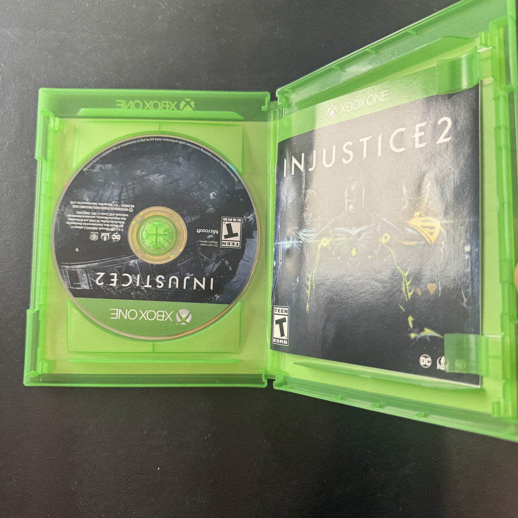Injustice 2 Xbox One video game disc in its original case published by Warner Bros