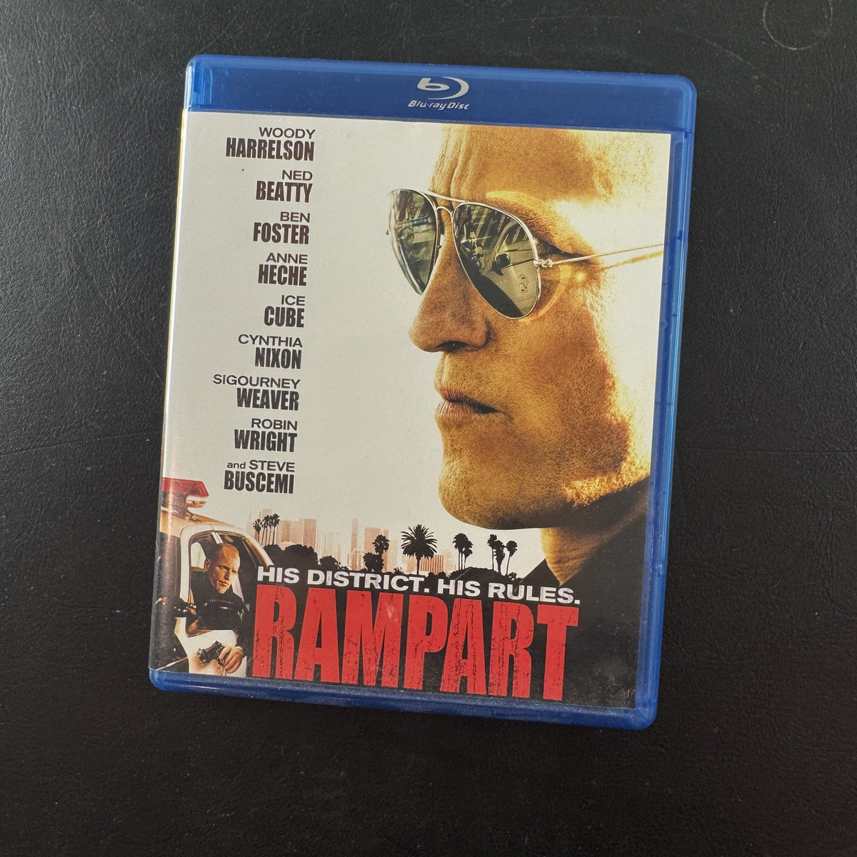 Rampart Blu-ray movie cover starring Woody Harrelson in the 2011 crime drama.