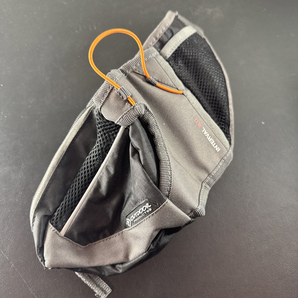 Pre-owned Outdoor Products Interval Adventure 8.0 hiking waist pack with built-in water bottle holder