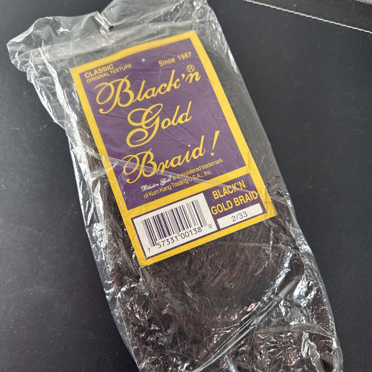 Black 'n Gold Braid 50 inch synthetic hair extension in 1B/M shade